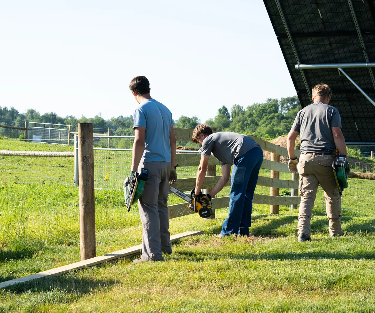 Fence crew building a durable rural fence
