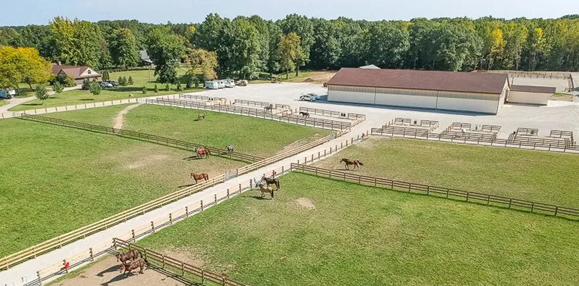 Aerial view of a fenced horse property